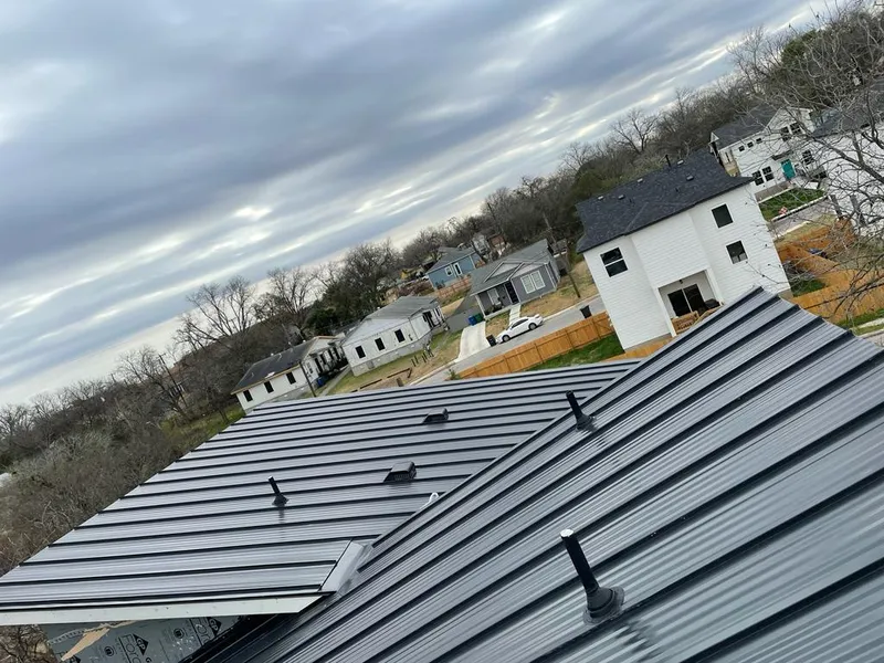 Standing seam metal roof panels with vents for Skylight Repair in Rock Falls